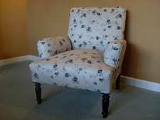 A French upholstered armchair