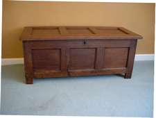 A small 18thC pine coffer