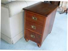 A colonial desk pedestal lamp table