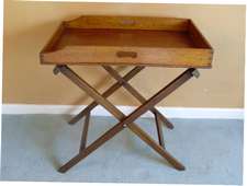 A 19thC oak butlers tray on stand