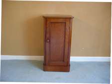 A victorian bedside cupboard