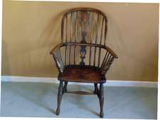 A 19thC ash and elm windsor chair