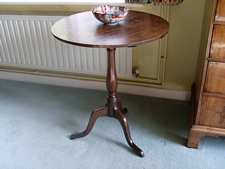 A Geo III oak tilt top tripod table