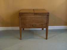 A Georgian oak bedside stand