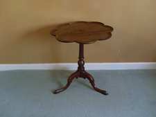 A Georgian petal top tripod table