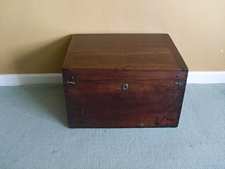 A small Georgian mahogany trunk