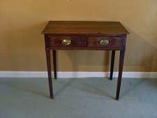 A Georgian oak side table