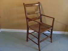 A French fruitwood armchair