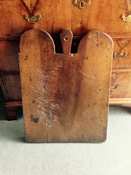 A huge 18thC chopping board in walnut