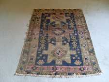 An antique Caucasian rug