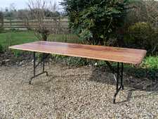 A 10 seater Victorian pine topped folding table