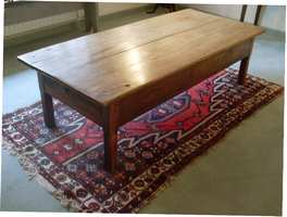 A huge impressive elm topped coffee table 