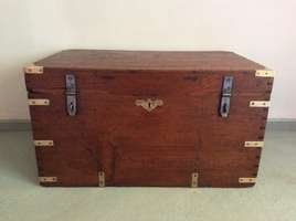 A colonial teak campaign trunk