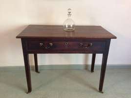 A Georgian oak side table