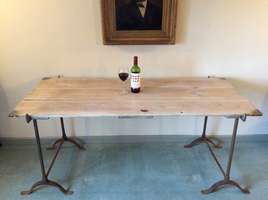 An iron trestle based table