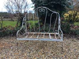 A French ironwork double seat chair