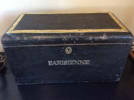 A vintage car runnerboard tool box