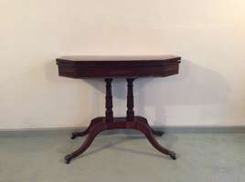 A fine brass inlaid Regency card table