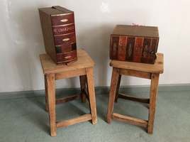 A pair of oak stools