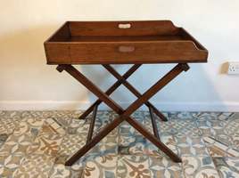 A 19thC mahogany butlers tray on stand