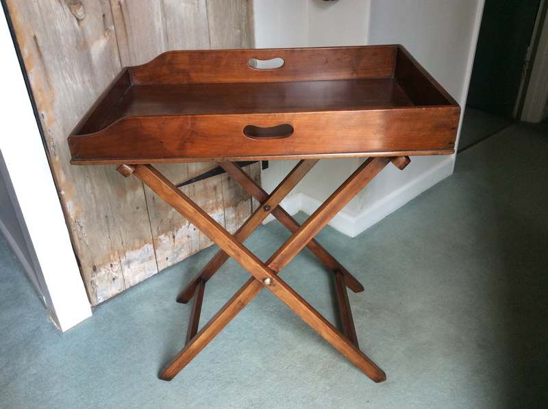 A 19thC mahogany butlers tray on stand