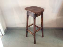 A tall elm kitchen stool