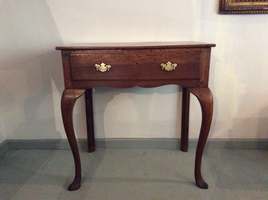 A Georgian oak hall side table