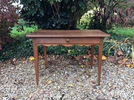 A rustic French side table