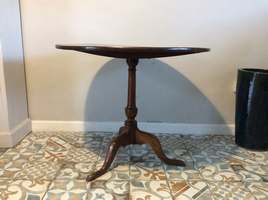 A Geo III oak and elm tripod table