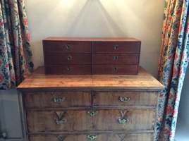 A desk top bank of six drawers