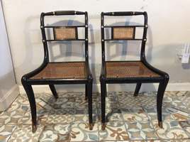 A pair of Regency hall chairs