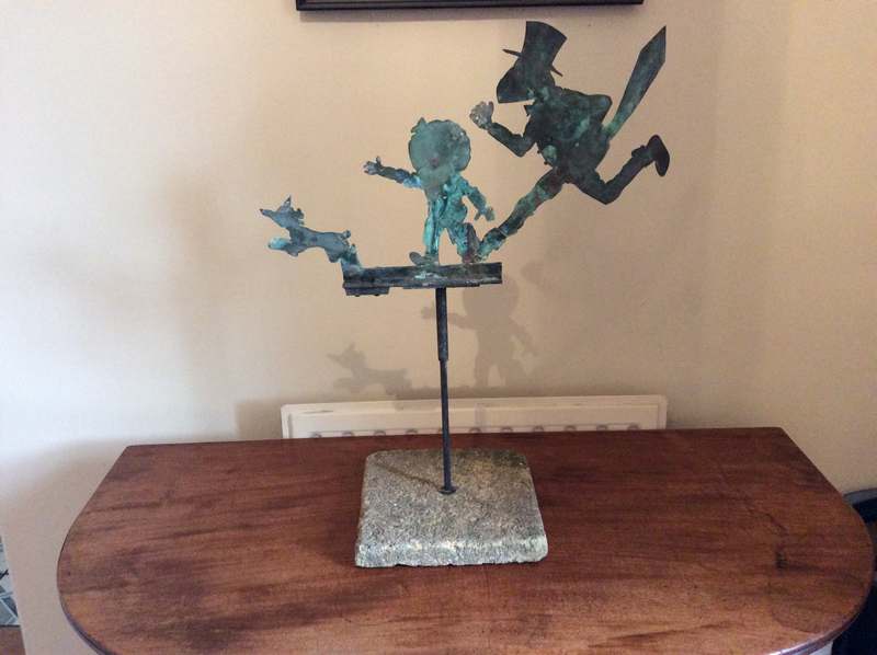 An antique copper weather vane