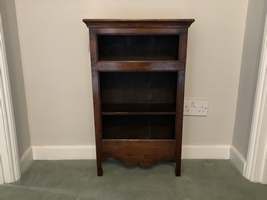 A diminutive dwarf bookcase