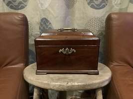 A Georgian tea caddy with SECRET DRAWER