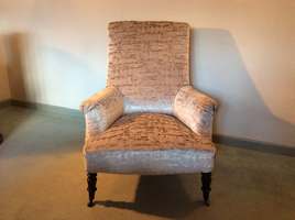 A Velvet and linen covered French armchair