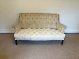 A French buttoned sofa