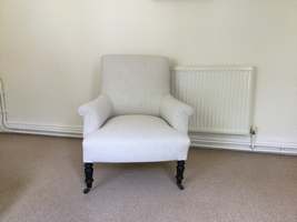 A French upholstered armchair