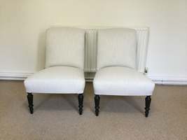A pair of 19thC scroll back slipper chairs