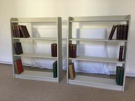 A pair of painted pine open bookcases