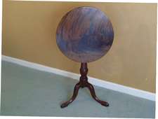 A small Geo III magogany tilt top